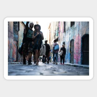 Background abstract street scene of people walking away taken in  Hosier Lane Sticker